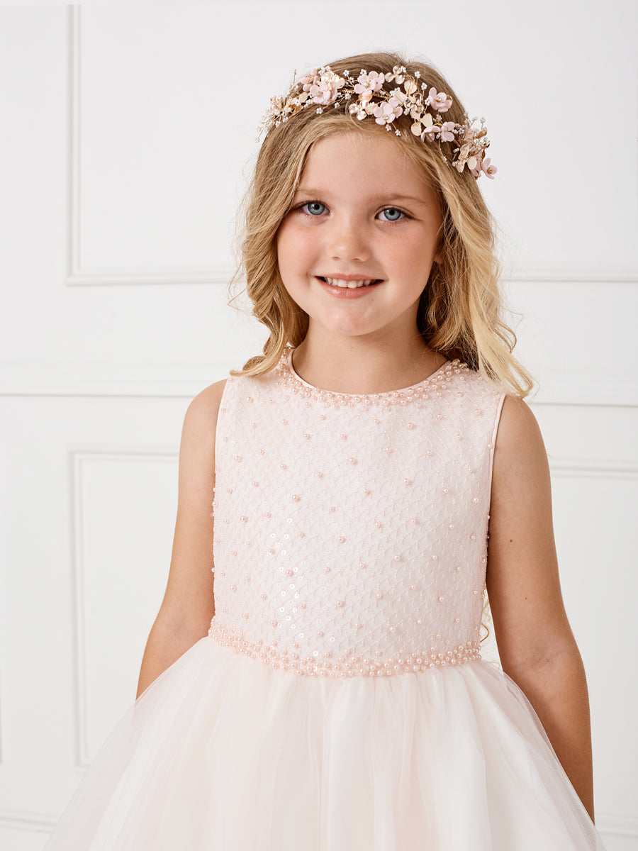 Girls Criss Cross Bodice with Tulle Skirt. Has a Rear Center Zipper and Sash Tie Back