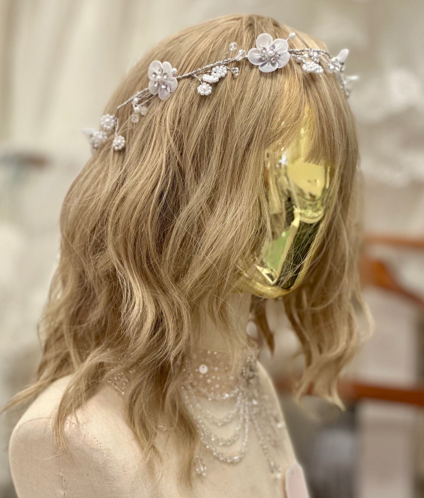 Floral headpiece with rhinestones and pearl accents